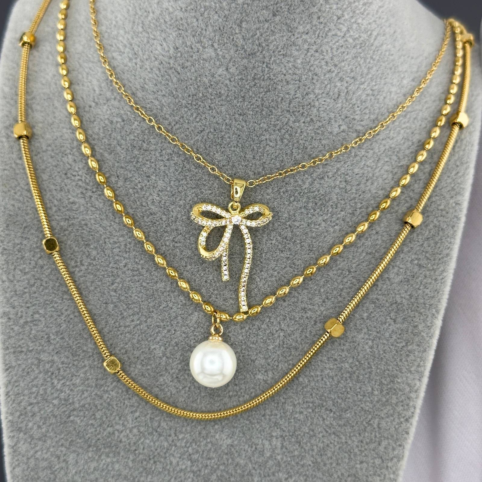 Collier pendentif nœud en acier inoxydable plaqué or 18K avec zircone cubique, longueur de chaîne 41cm + 5cm, imperméable et hypoallergénique.