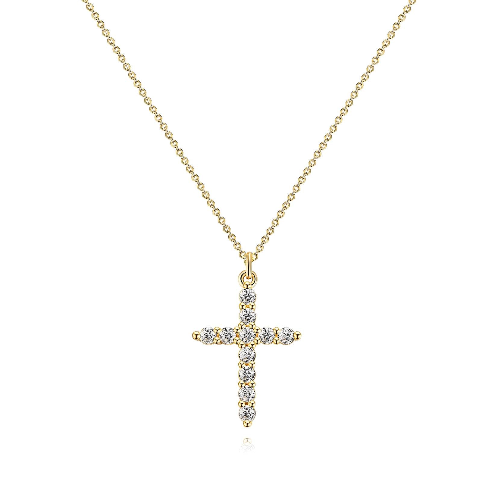 Collier Croix, Acier Inoxydable Plaqué Or 18K Collier croix élégant en acier inoxydable plaqué or 18K. Résistant à l'eau et à la corrosion, ce pendentif allie durabilité et sophistication. Parfait pour un style intemporel et raffiné.